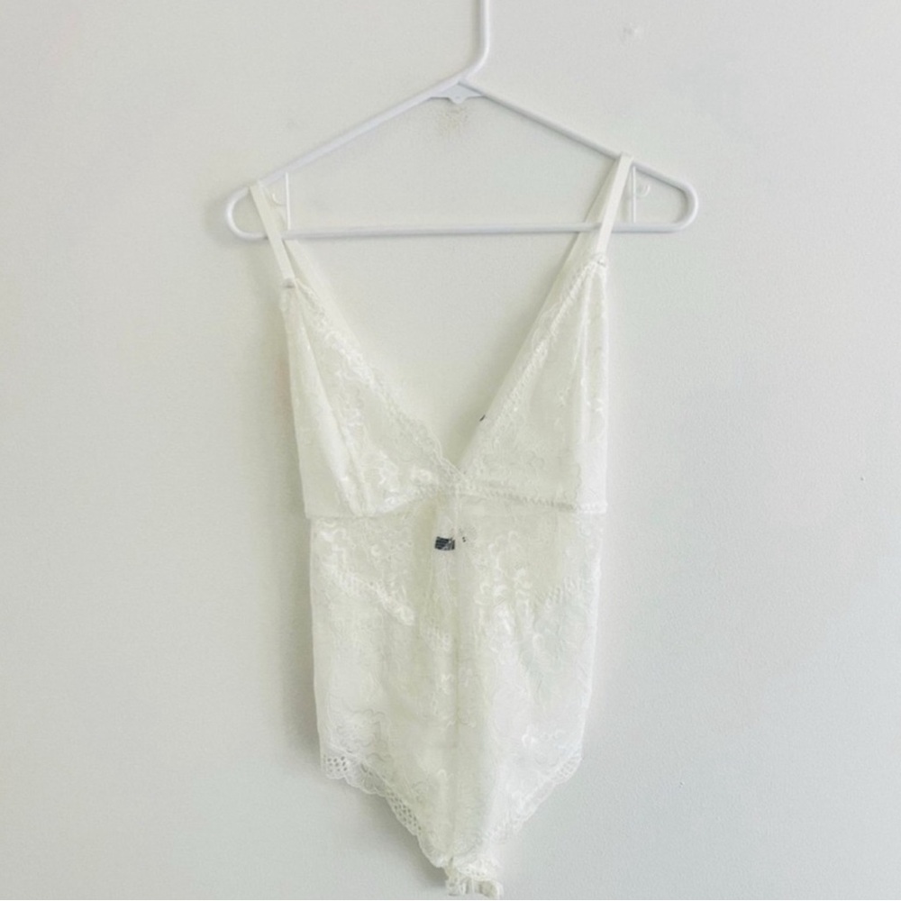 Elegant White Lace Bodysuit